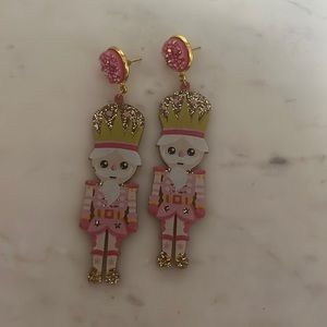 Cora’s den festive nutcracker earrings